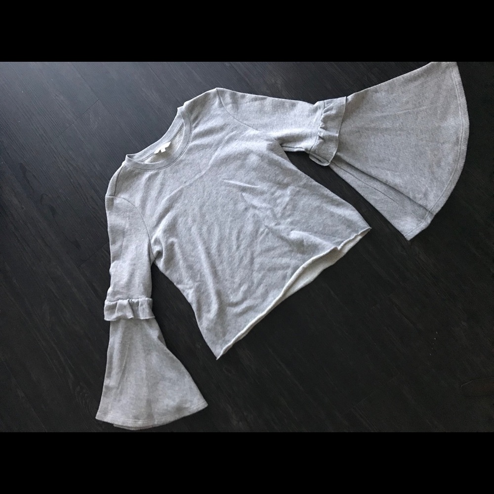 Candie’s gray sweater